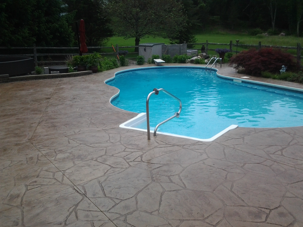 Swimming pool and stamped concrete project example 149